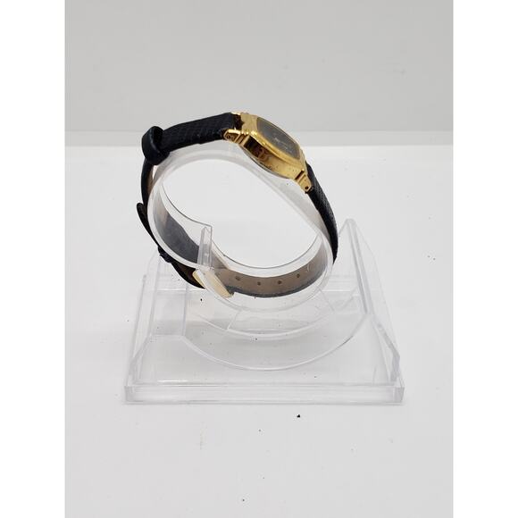 Lorus women\'s drees watch. Black face with gold trim. V810-6340 RO main image 4